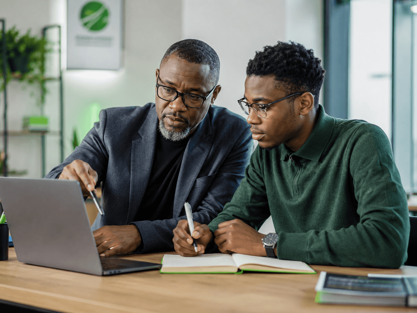 Mentor guiding a young learner